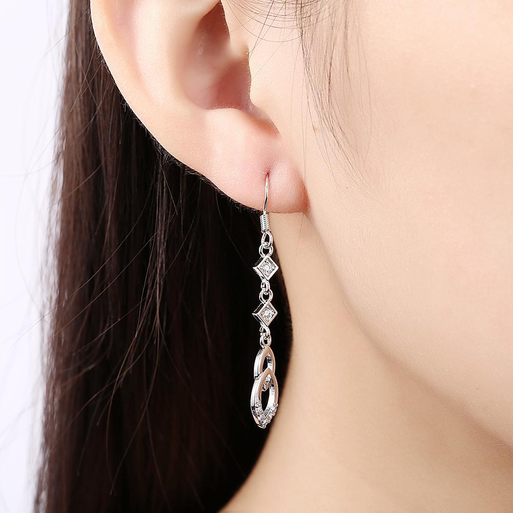 Dangling Infinity Drop Earrings Made with Elements