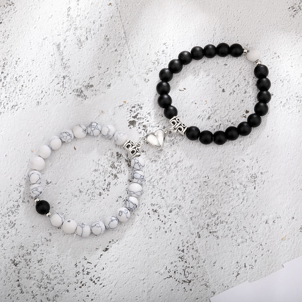 A Pair Of New Peach Heart Magnet Family Bracelets