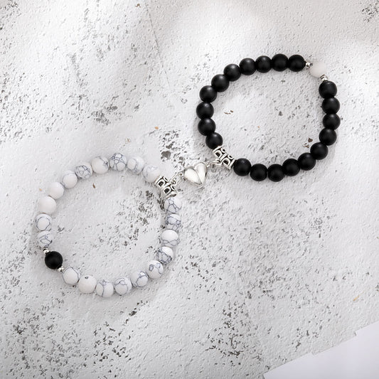 A Pair Of New Peach Heart Magnet Family Bracelets