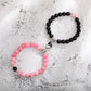 A Pair Of New Peach Heart Magnet Family Bracelets