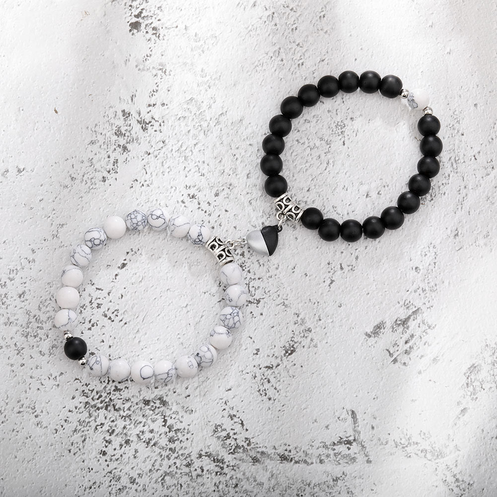 A Pair Of New Peach Heart Magnet Family Bracelets