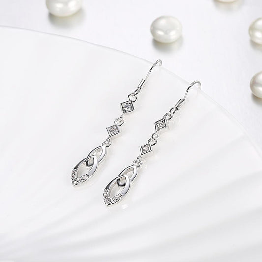 Dangling Infinity Drop Earrings Made with  Elements
